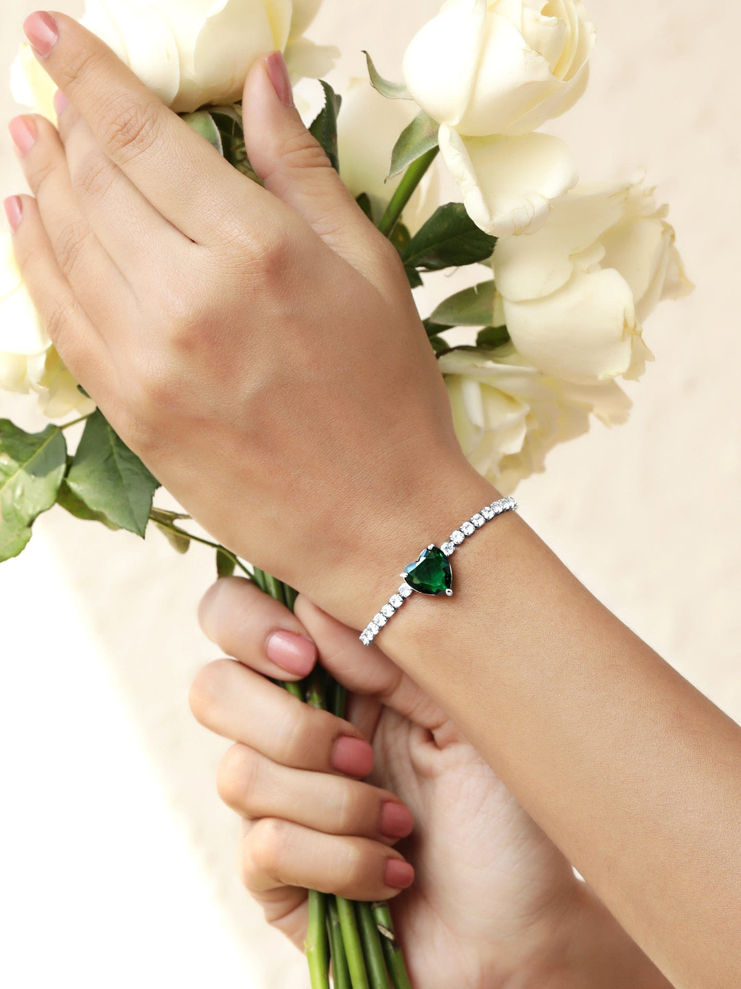 Rhodium Plated Emerald Studded Heart Shaped Zirconia Bracelet with Zirconia Accents Bangles & Bracelets