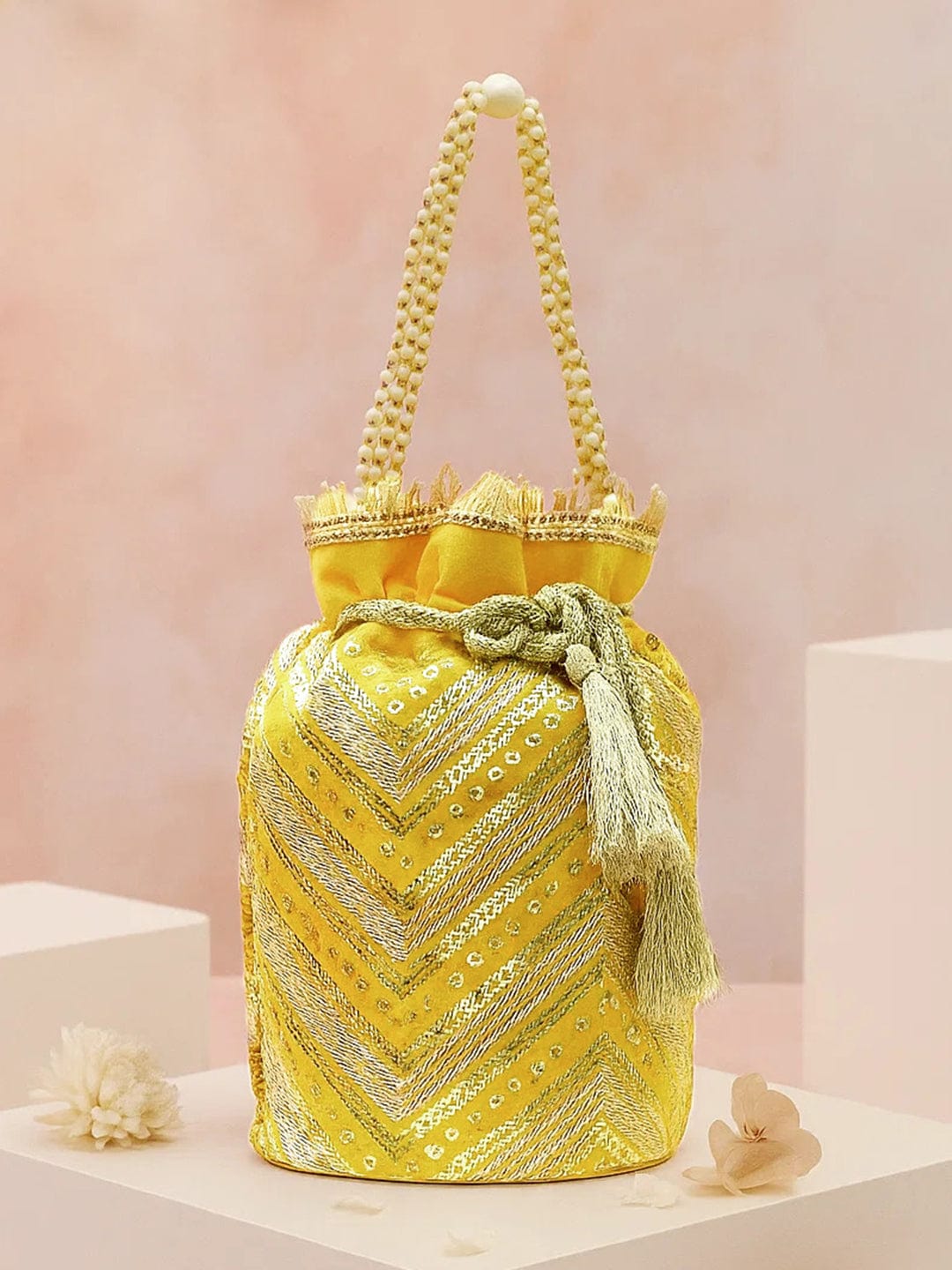 Rubans Bright Yellow Sequin Embroidered Festive Potli Bag with Pearl Handle Golden Beaded Tassels