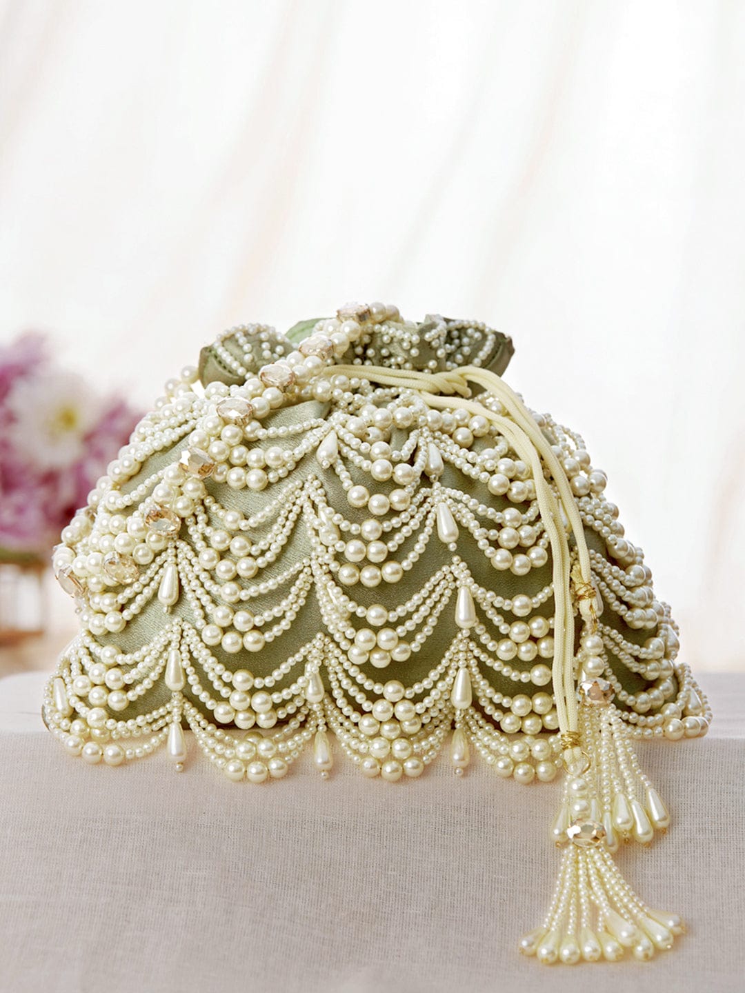 Shop Rubans Cream Coloured Velvet Potli Bag With Pearls And Golden Beads Online at Rubans