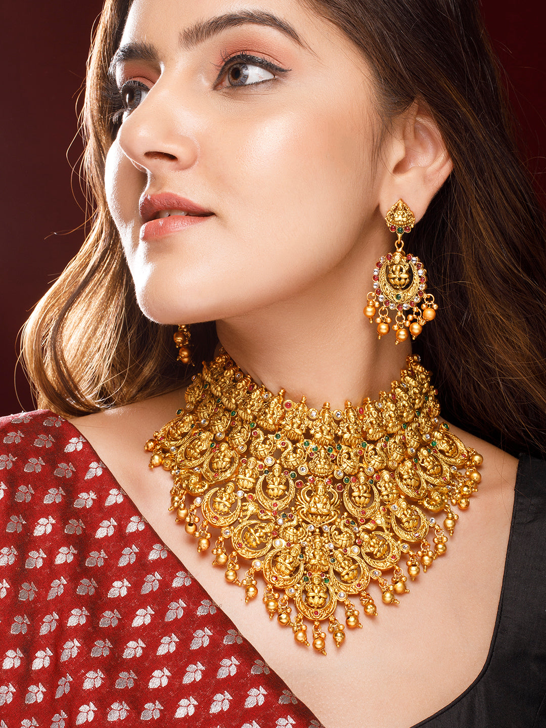 Rubans 22K Gold Plated Red, Green & White Stone Studded Lakshmi Motif Temple Jewellery Set