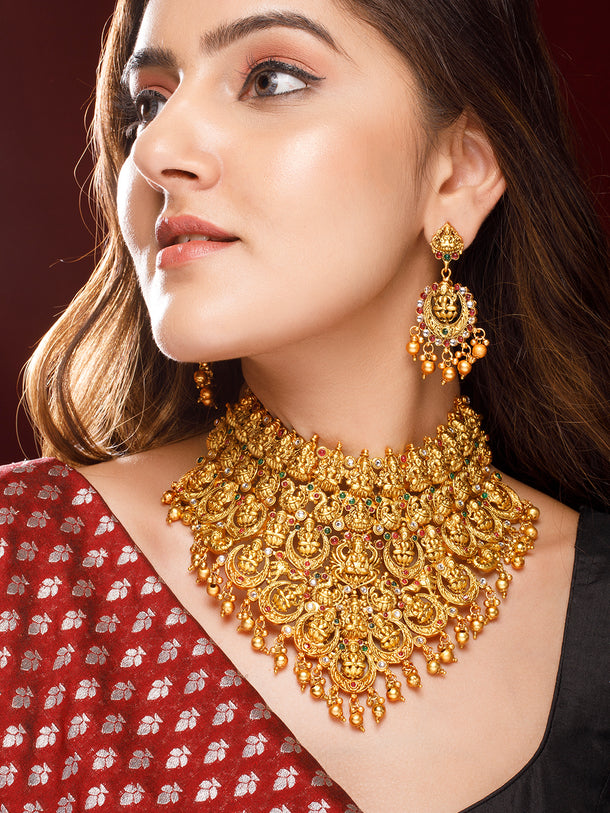 Rubans 22K Gold Plated Red, Green & White Stone Studded Lakshmi Motif Temple Jewellery Set