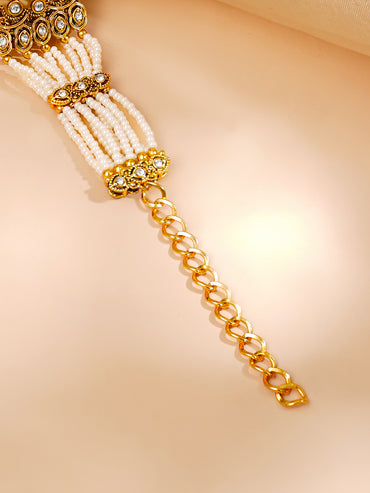 Gold Plated Pearl Beaded Kundan Emerald Floral Bracelet