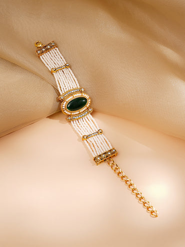 Gold Plated Pearl Beaded Multi Strand Kundan Emerald Centered Bracelet