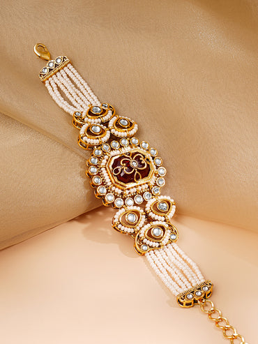 Gold Plated Pearl Beaded Multi Strand Kundan Ruby Centered Bracelet