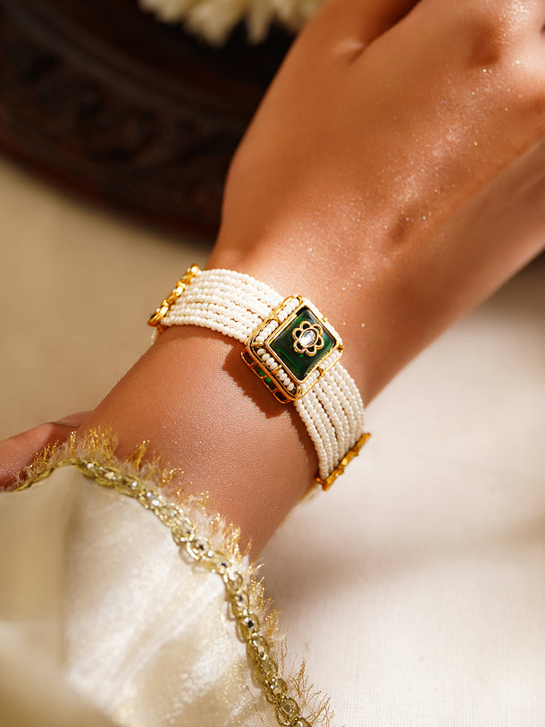 Gold Plated Pearl Beaded Multi Strand Kundan Green Cubic Bracelet