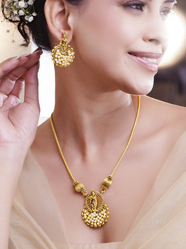 Laxmi Motif Pearl Embellished Pendant Necklace Set