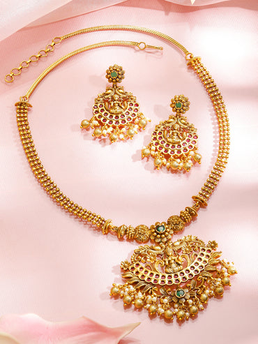 Laxmi Motif Green Studded Gold Necklace Set