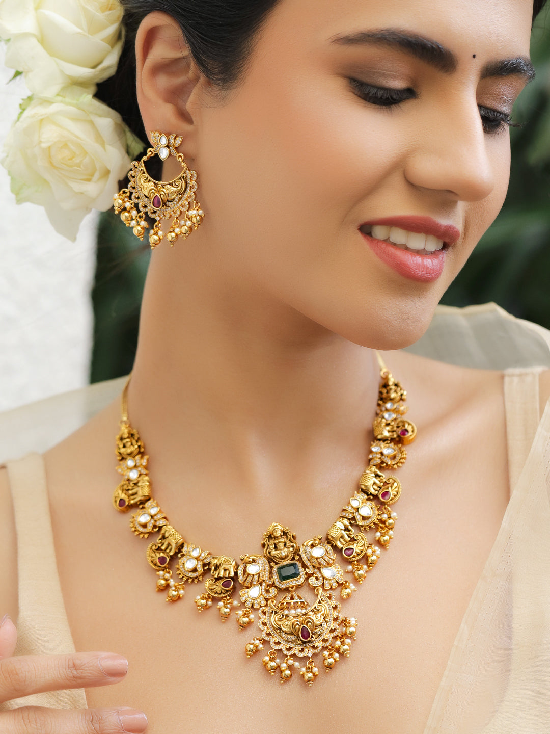 Multicolor Studded Laxmi Motif Gold Necklace Set