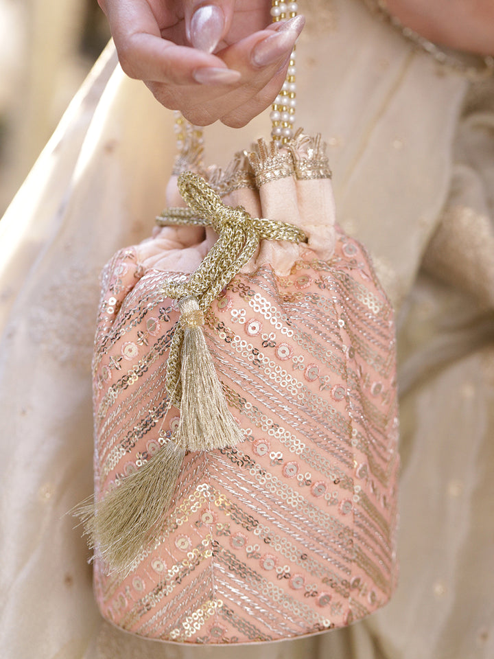 Rubans Peach Pink Sequin Embellished Potli Bag with Pearl Handle & Golden Beaded Tassel Detailing