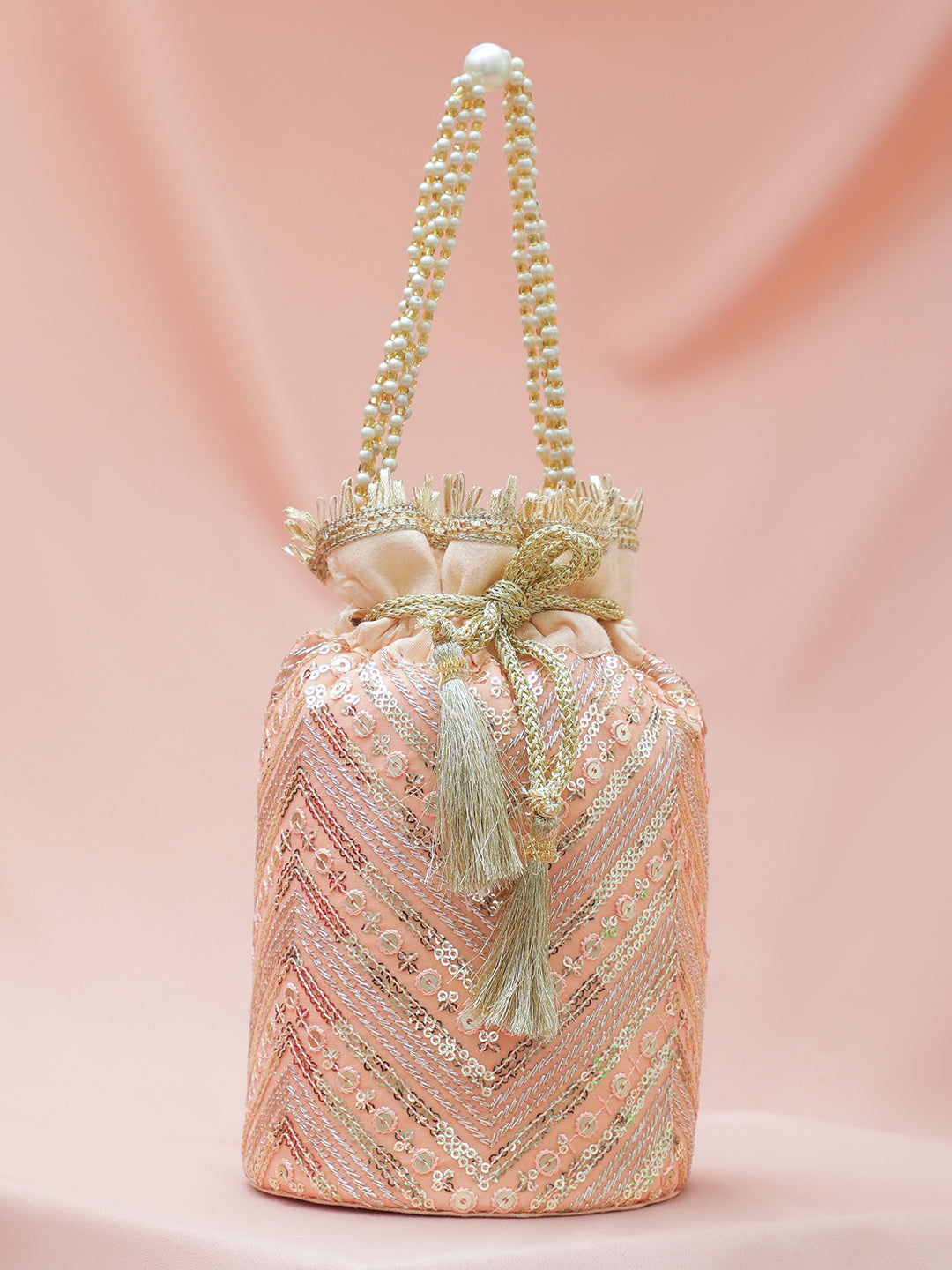 Rubans Peach Pink Sequin Embellished Potli Bag with Pearl Handle & Golden Beaded Tassel Detailing