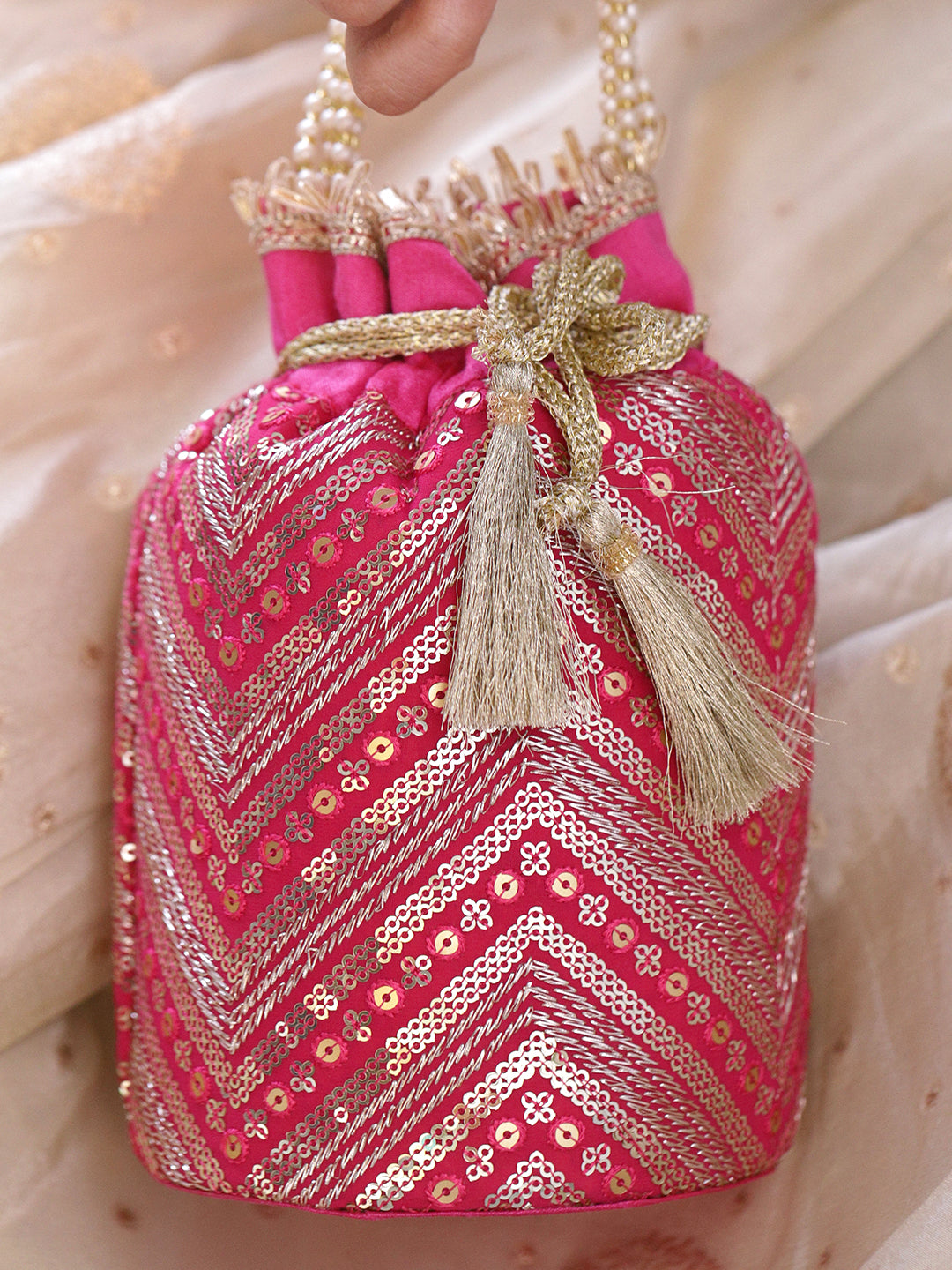 Rubans Hot Pink Sequin Embroidered Festive Potli Bag with Pearl Beaded Handle & Golden Tassels