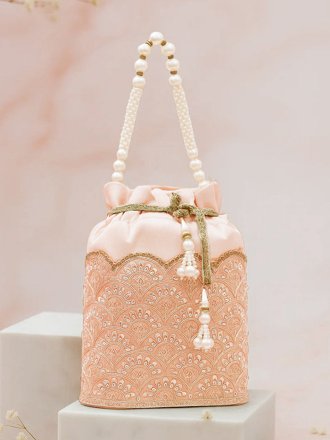Women Peach Fabric Potli Bag with Golden Embroidery, White Stones & Pearl Tassel Handle