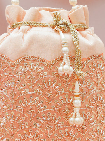 Women Peach Fabric Potli Bag with Golden Embroidery, White Stones & Pearl Tassel Handle