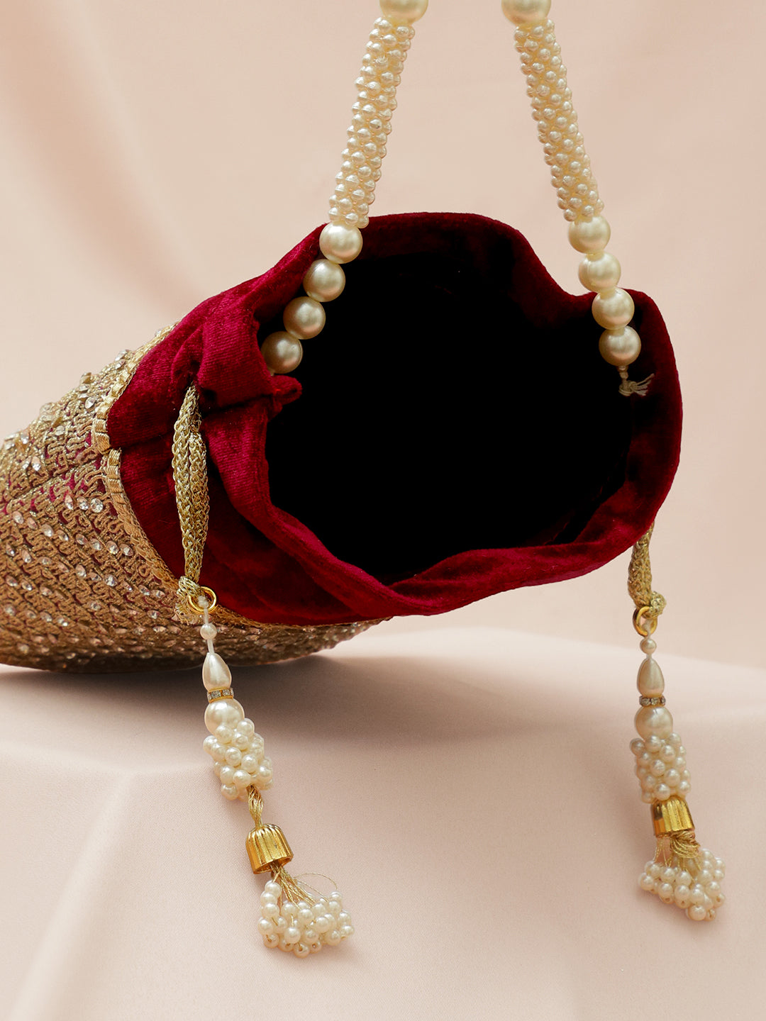 Rubans Red Velvet Potli Bag with Pearl Handle, Golden Embroidery & Stone Detailing