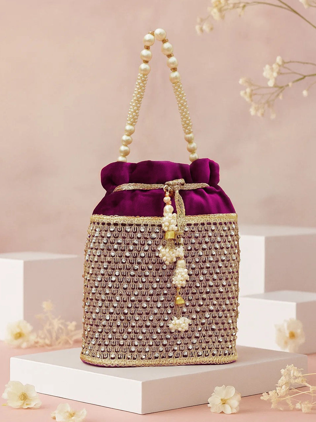 Rubans Purple Velvet Potli Bag with Pearl Handle, Golden Embroidery & Stone Detailing