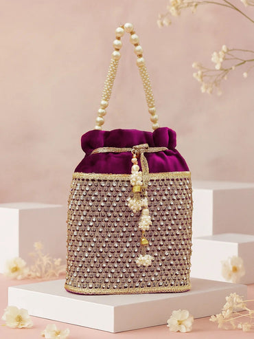 Rubans Purple Velvet Potli Bag with Pearl Handle, Golden Embroidery & Stone Detailing