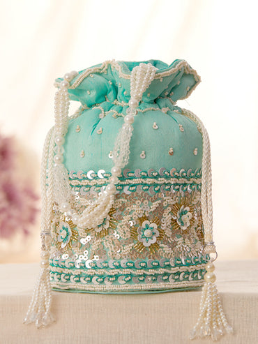 Rubans Mint Coloured Potli Bag With Golden And White Embroided Design.