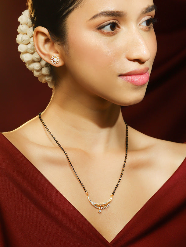 Rubans 18K Gold-Plated White Cubic Zirconia Studded Crescent Moon Mangalsutra Set with Black Beaded Chain & Floral Earrings