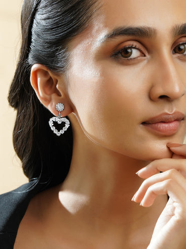 Rubans Voguish Rhodium Plated Crystal AD Embellished Heart-Shaped Drop Earrings