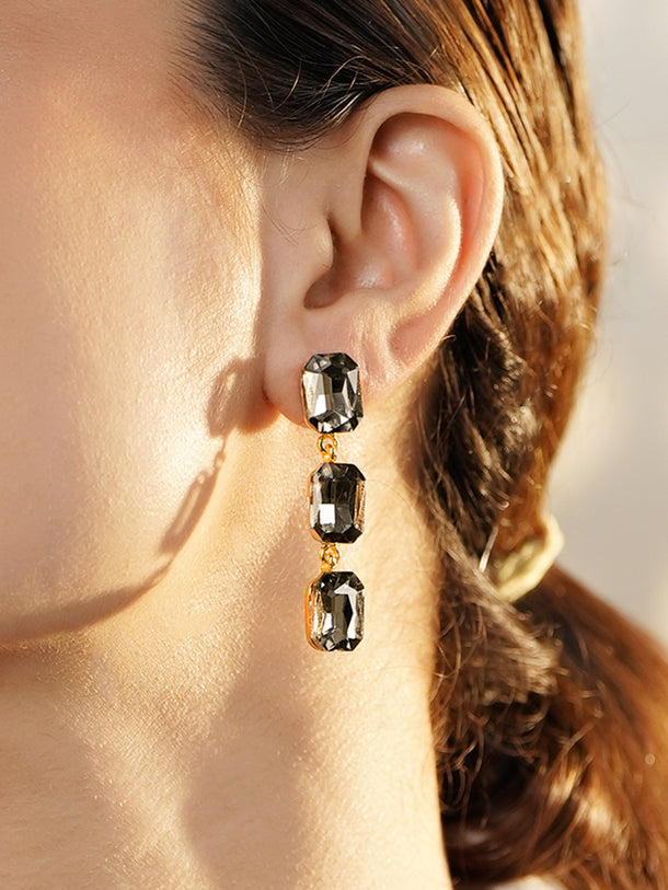 Gold Toned Grey Crystal Dangler Earrings