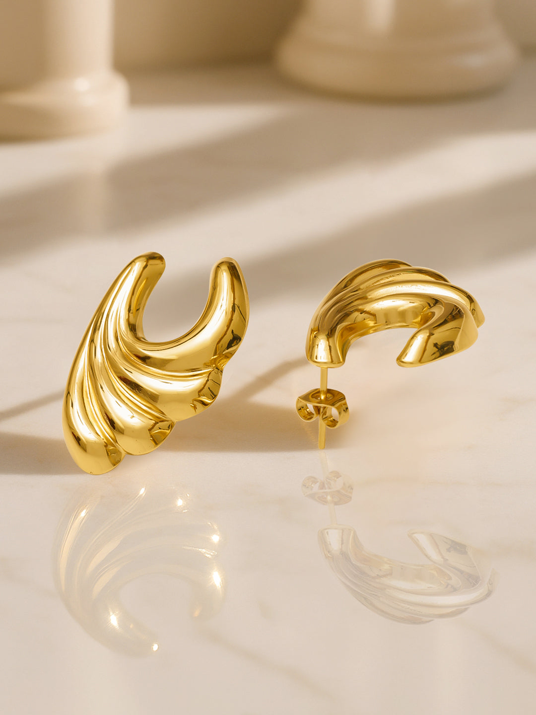 Gold Toned Swirl Pattern Stud Earrings