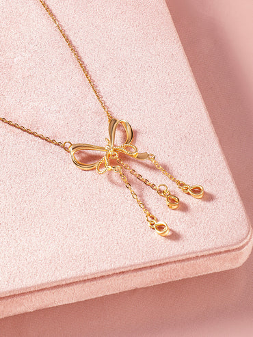 Ribbon Motif Gold Pendant Necklace