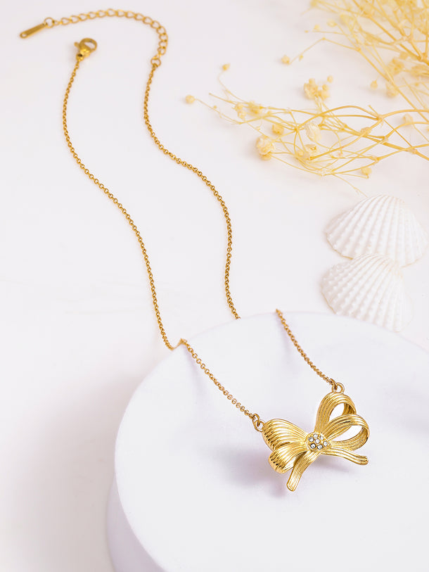 Gold Toned Bow Motif Pendant