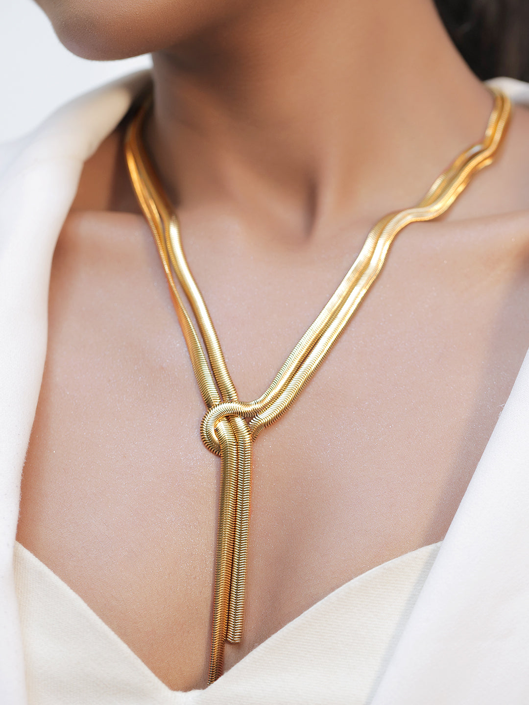 Rubans Voguish Dual-Plated Stainless Steel Tarnish-Free Waterproof Knot Tassel Necklace