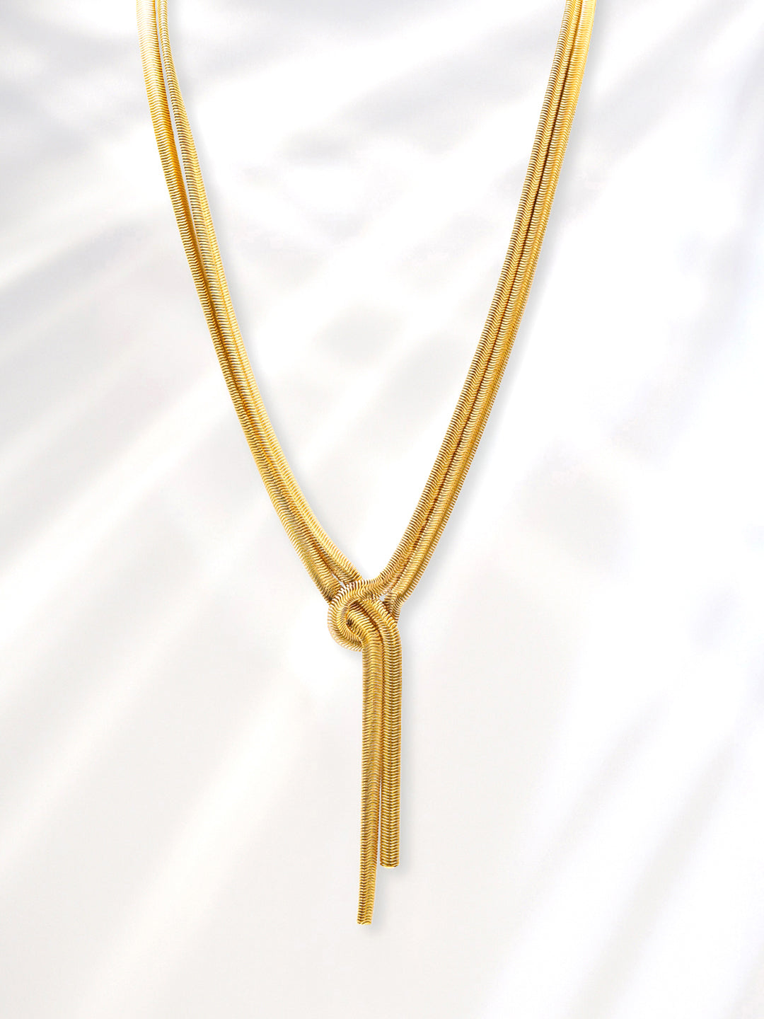 Rubans Voguish Dual-Plated Stainless Steel Tarnish-Free Waterproof Knot Tassel Necklace