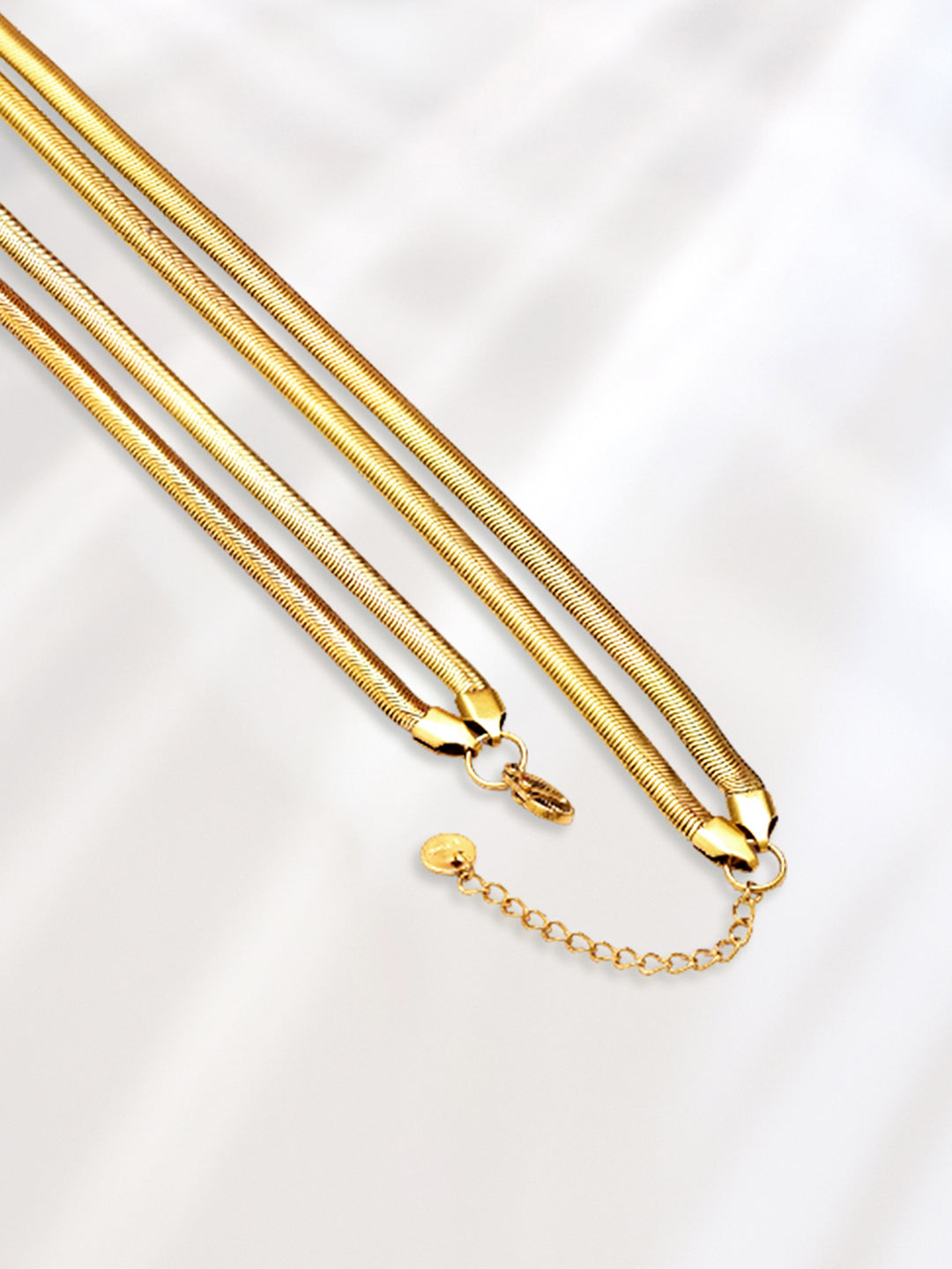 Rubans Voguish Dual-Plated Stainless Steel Tarnish-Free Waterproof Knot Tassel Necklace