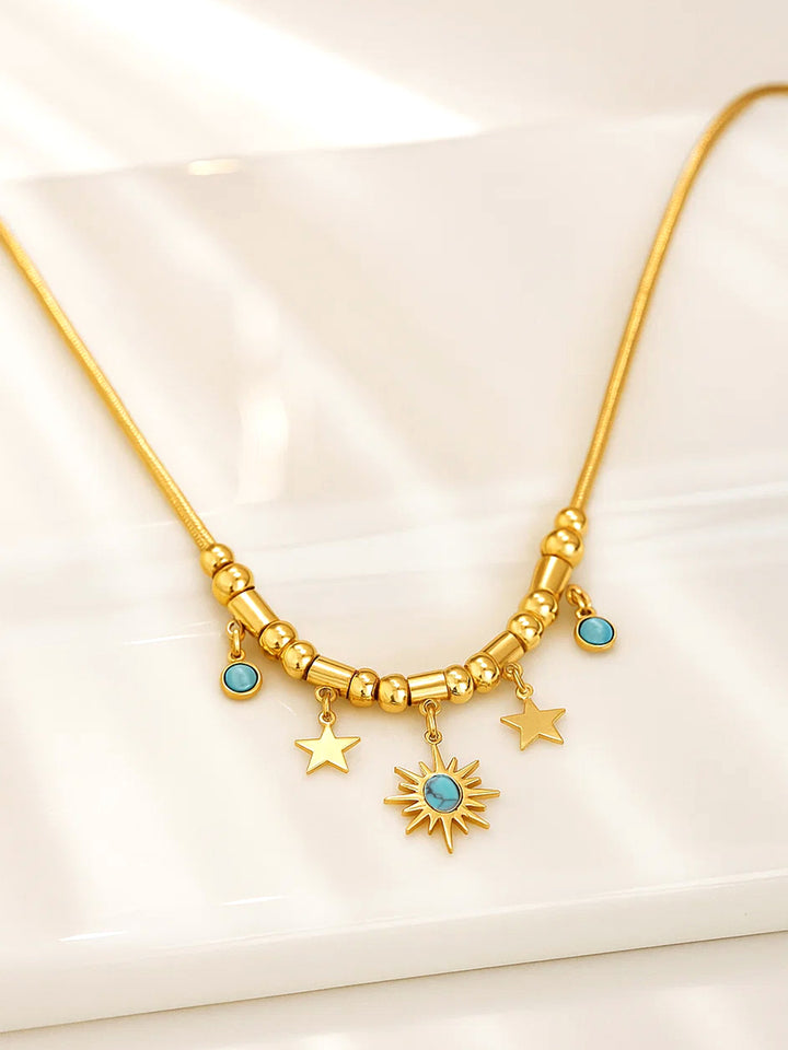 Rubans 22K Gold-Plated Brass Statement Charm Necklace with Sun, Star & Turquoise Blue Beads