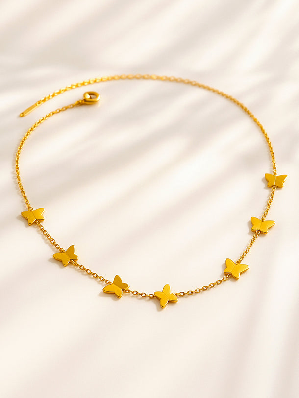 Gold Layered Necklace With Butterfly Accent