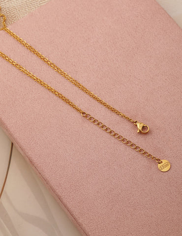 Gold Layered Necklace With Floral Accent