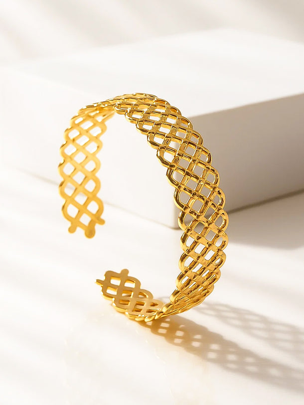 Golden Bracelet With Geometric Cut Pattern