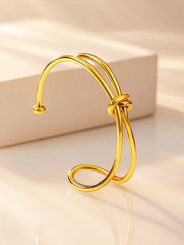 Rubans Voguish 18K Gold-Plated Stainless Steel TarnishFree Waterproof Knot Design Bracelet