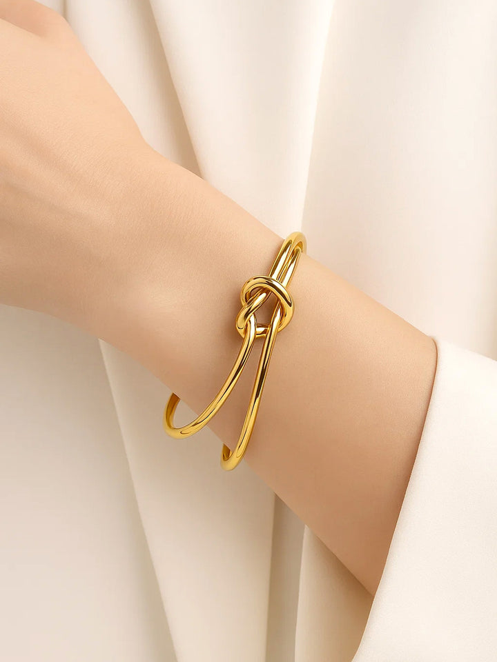 Rubans Voguish 18K Gold-Plated Stainless Steel TarnishFree Waterproof Knot Design Bracelet