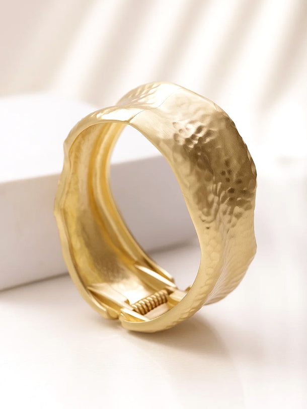 Gold Toned Sculpted Hammered Statement Bracelet