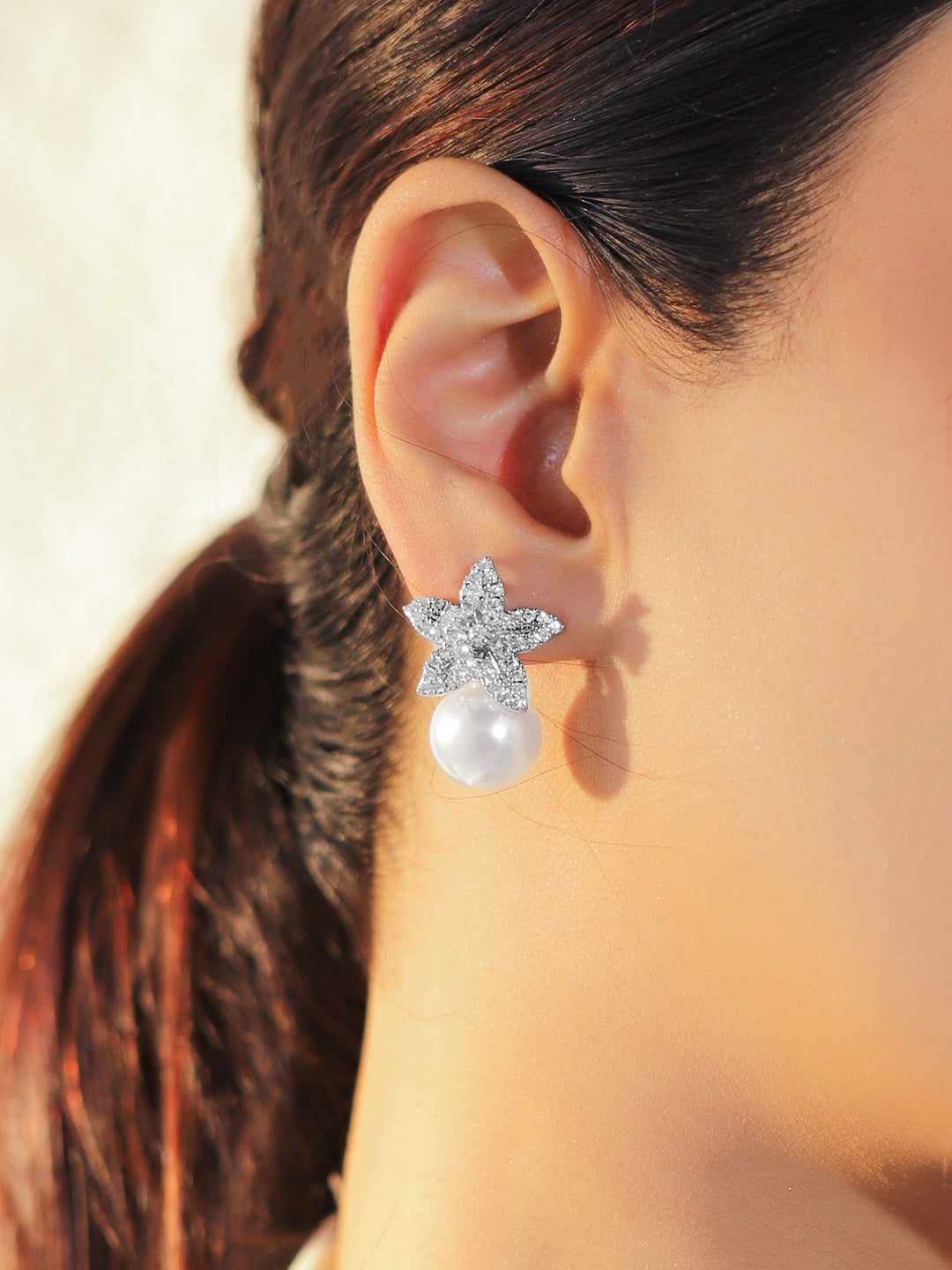 Rubans Rhodium-Plated Cubic Zirconia Studded And Pearls Beaded Floral Shaped Drop Earrings