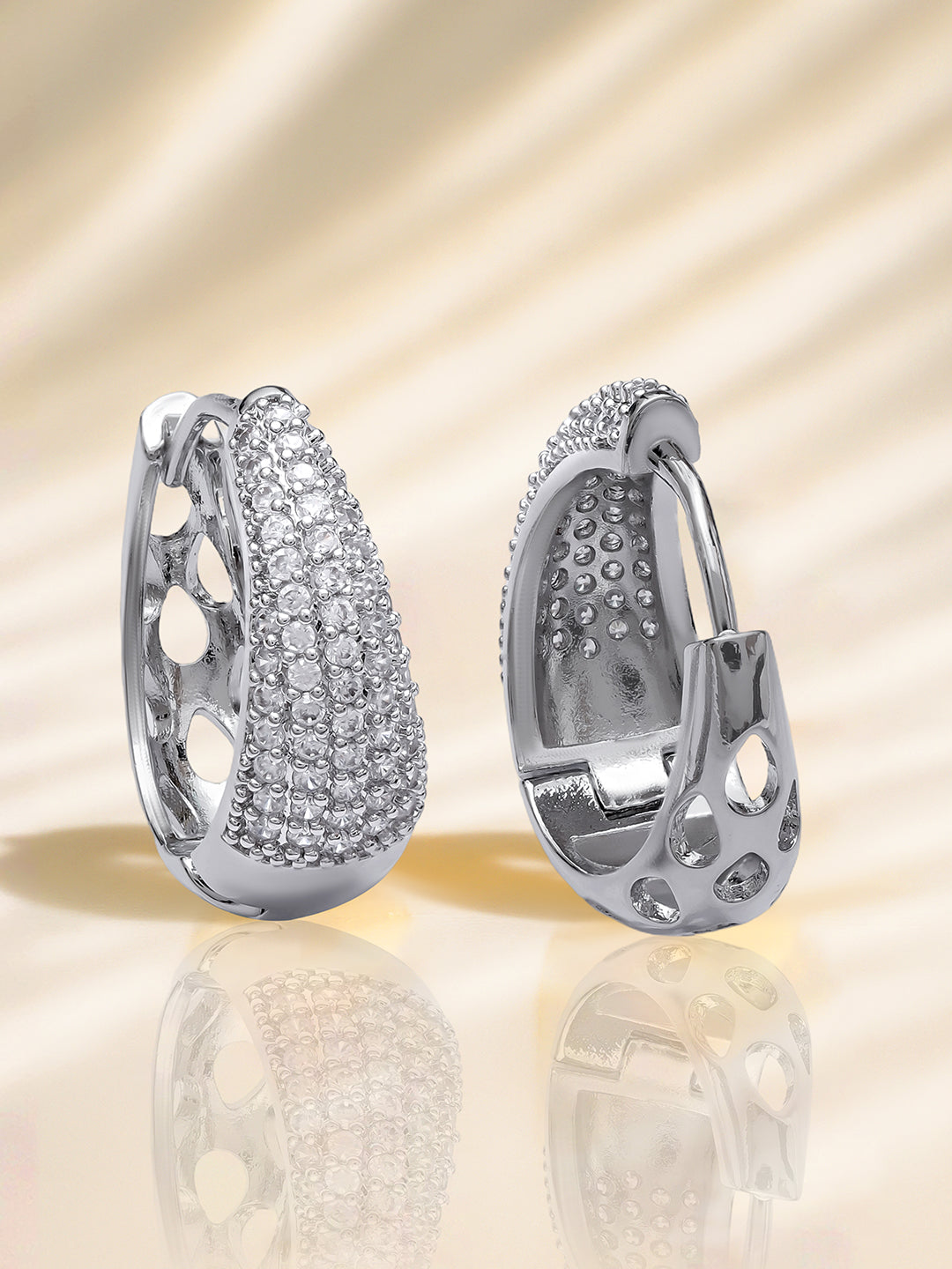 Rubans Rhodium-Plated Cubic Zirconia Studded Oval Shaped Hoop Earrings