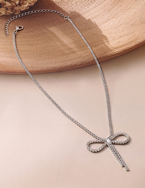 Rubans Rhodium Plated AD & Cubic Zirconia Studded Bow Design Statement Necklace