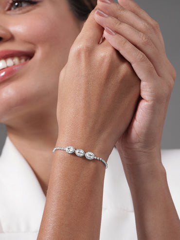 Rubans Rhodium Plated AD & Cubic Zirconia Studded Triple Oval Charm Bracelet