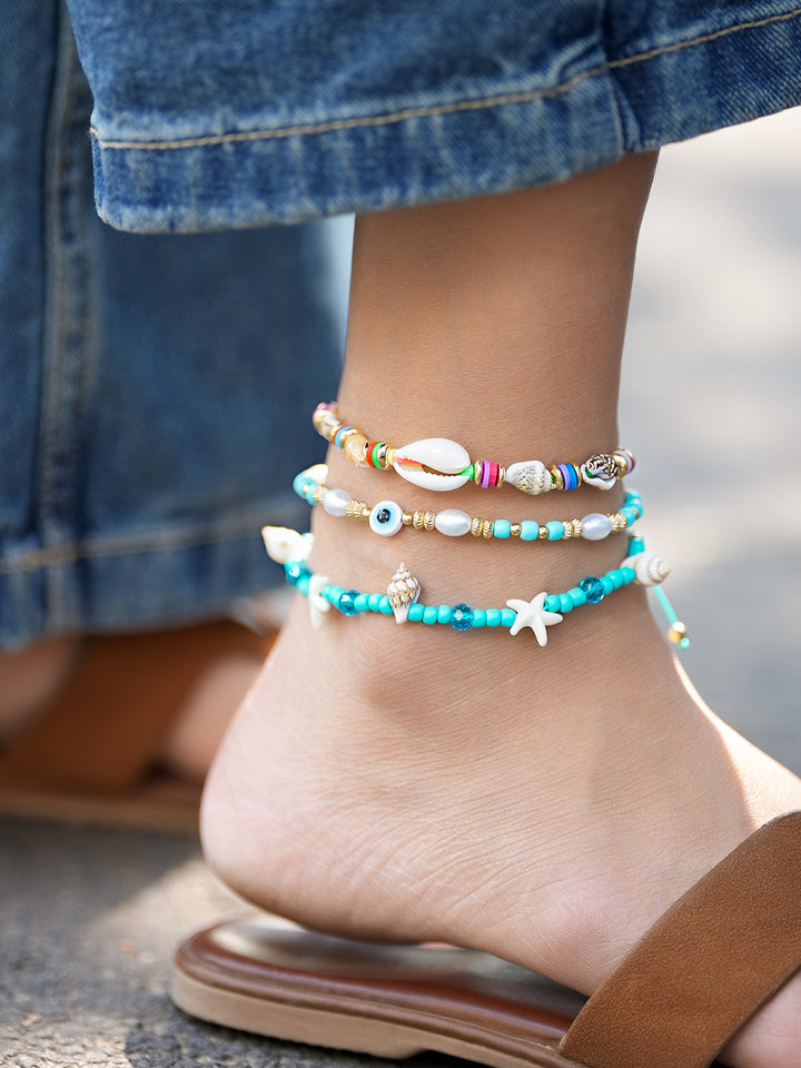 Rubans Set of 3 Adjustable Cord Anklets in Aqua & Multicolor with Shell Beads & Evil Eye