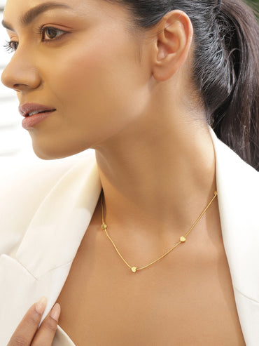 Gold Toned Necklace With Heart Beads