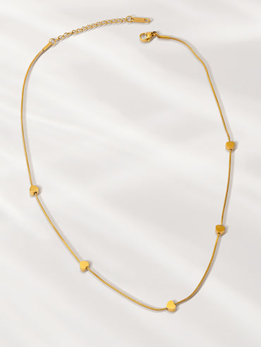 Gold Toned Necklace With Heart Beads