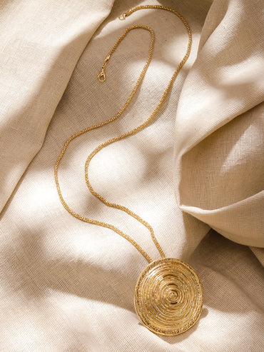 Gold Toned Spiral Motif Round Pendant