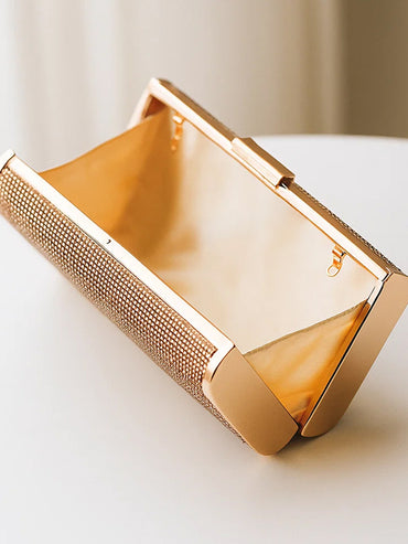 Festive Glow Structured Gold Clutch