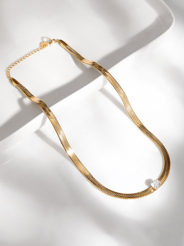 Rubans Voguish 18K Gold Plated Stainless Steel Waterproof Snake Chain With A Solitaire Zircon Studded Choker.