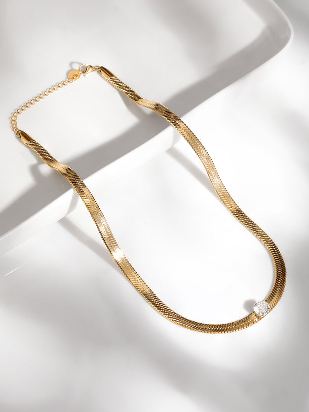 Rubans Voguish 18K Gold Plated Stainless Steel Waterproof Snake Chain With A Solitaire Zircon Studded Choker.