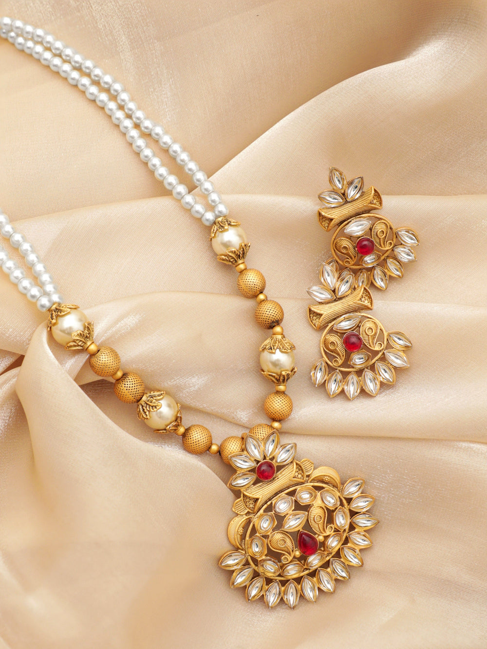 Gold-Colored Pendant Necklace Set with White Beads and Small Stones Jewellery Sets