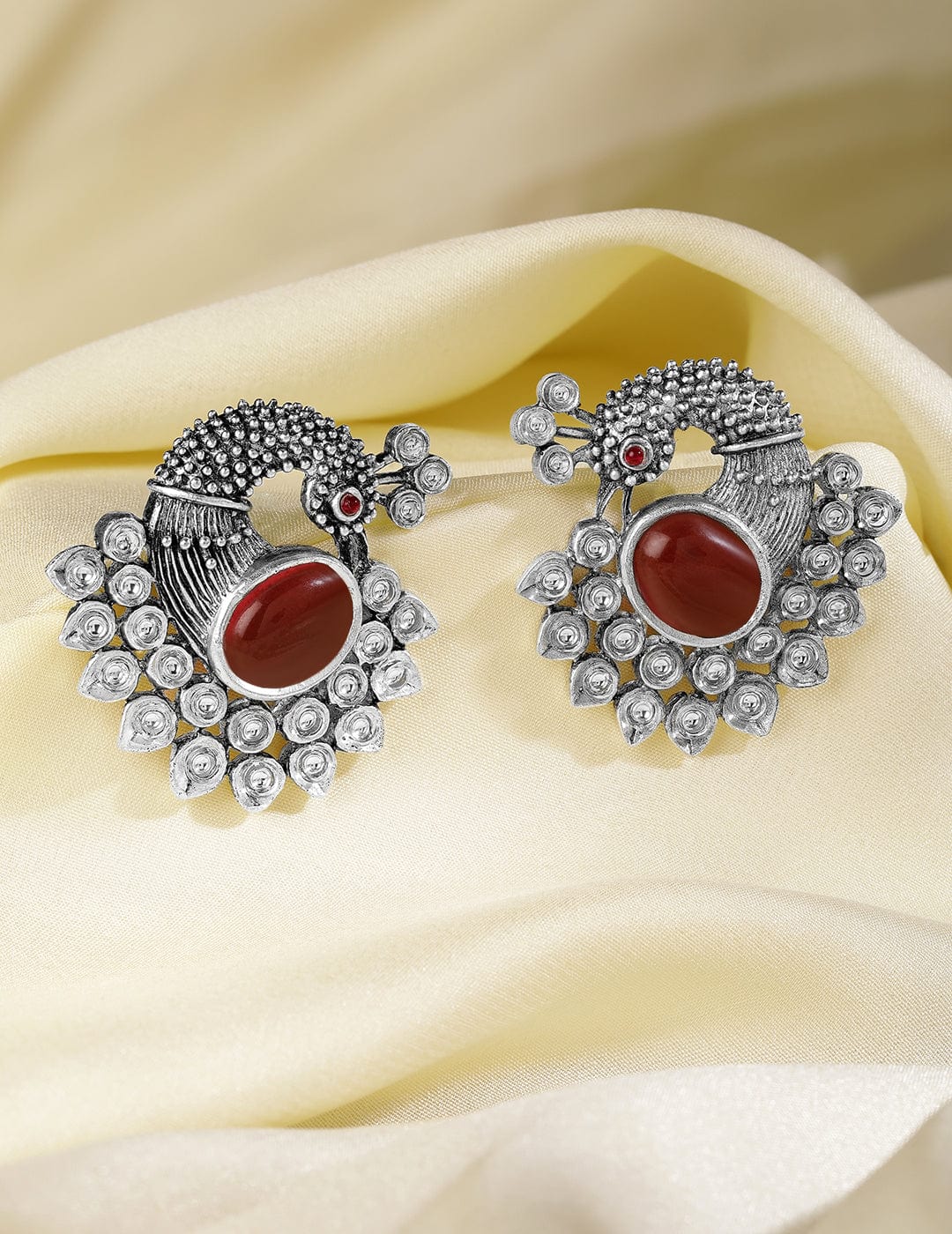 Oxidized Silver Plated Peacock Motif Stud Earrings with Ruby Studded Studs